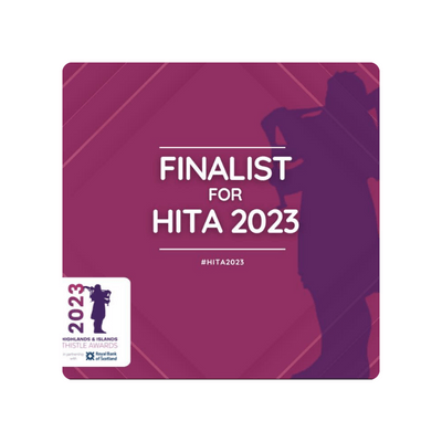2023 HITA finalists, Loch Ness Hub & Travel, with awards' thistle emblem, highlighting excellence in Highlands & Islands tourism.